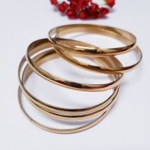 Conjunto com 6 Braceletes Dourado em Aço